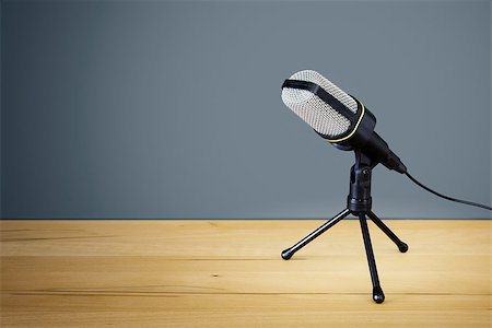 simsearch:400-04278062,k - An image of a typical microphone on a wooden desk Photographie de stock - Aubaine LD & Abonnement, Code: 400-08730682