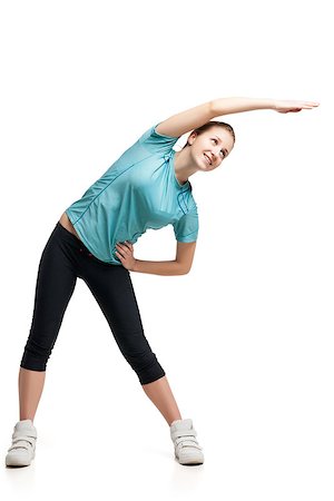 Beautiful sporty woman doing exercise . Isolated on white background Fotografie stock - Microstock e Abbonamento, Codice: 400-08730803