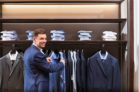 fashion store manager - Smiling businessman in store Stock Photo - Budget Royalty-Free & Subscription, Code: 400-08730864