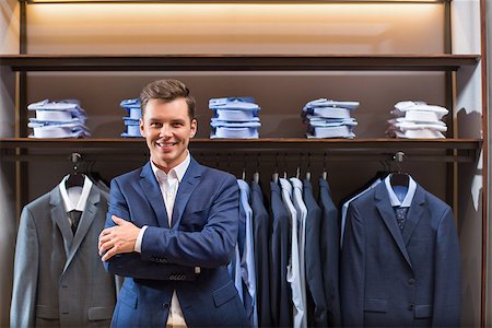 fashion store manager - Smiling businessman in suit indoors Stock Photo - Budget Royalty-Free & Subscription, Code: 400-08730865