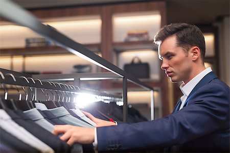 fashion store manager - Young businessman in suit indoors Stock Photo - Budget Royalty-Free & Subscription, Code: 400-08730866