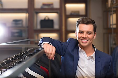 fashion store manager - Smiling businessman in suit indoors Stock Photo - Budget Royalty-Free & Subscription, Code: 400-08730867