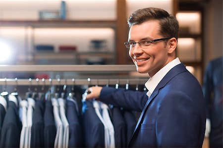 fashion store manager - Smiling businessman in store Stock Photo - Budget Royalty-Free & Subscription, Code: 400-08730861