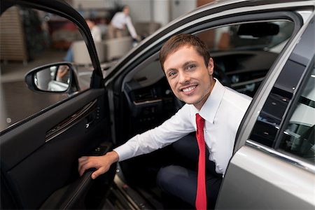 simsearch:400-08413489,k - Young attractive seller in car Stock Photo - Budget Royalty-Free & Subscription, Code: 400-08730871