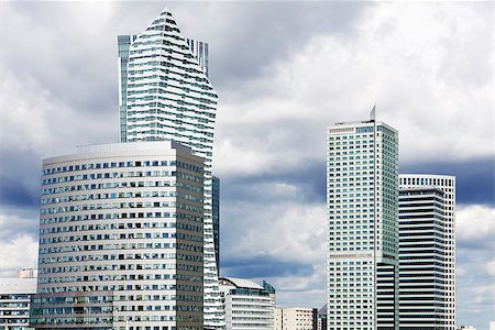 simsearch:400-08730397,k - Modern skyscrapers in business district in Warsaw at sunny day. Photographie de stock - Aubaine LD & Abonnement, Code: 400-08730952