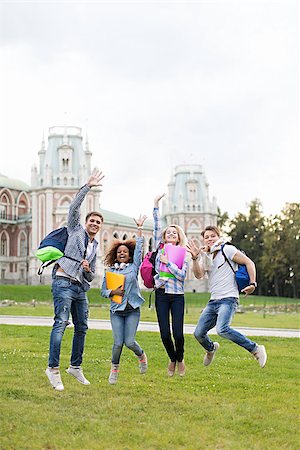 people graduation jump - Jumping young student in campus Stock Photo - Budget Royalty-Free & Subscription, Code: 400-08731154