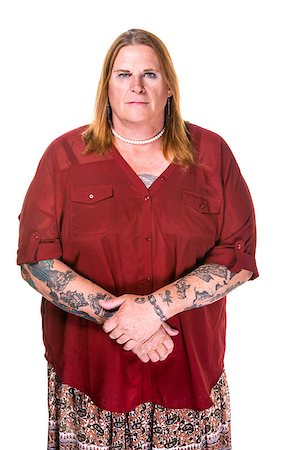 Thoughtful or stern transgender woman in pearl necklace on white background Stock Photo - Budget Royalty-Free & Subscription, Code: 400-08731299