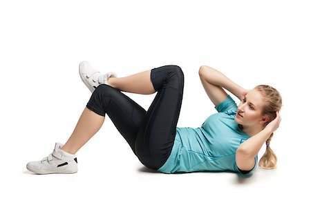 Beautiful sporty woman doing exercise on the floor. Isolated on white background Fotografie stock - Microstock e Abbonamento, Codice: 400-08731319