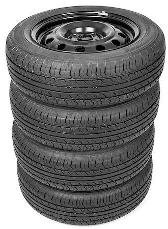 simsearch:400-08919664,k - Stack of four wheel black tyres for summer isolated on white background Stockbilder - Microstock & Abonnement, Bildnummer: 400-08731348
