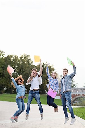 people graduation jump - Jumping people in park Stock Photo - Budget Royalty-Free & Subscription, Code: 400-08731706