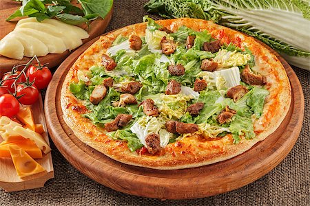 pizza wood - Pizza with meat, tomatoes, mozzarella and salad Stock Photo - Budget Royalty-Free & Subscription, Code: 400-08731702