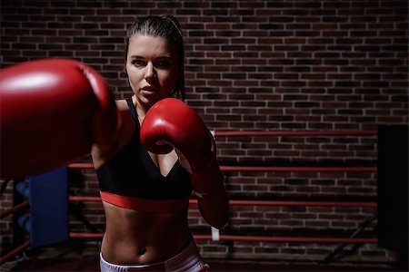 Young girl with boxing gloves Stock Photo - Budget Royalty-Free & Subscription, Code: 400-08731719