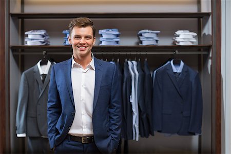 fashion store manager - Smiling young man in store Stock Photo - Budget Royalty-Free & Subscription, Code: 400-08731710