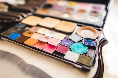 makeup cosmetics and brushes on the white table Stock Photo - Budget Royalty-Free & Subscription, Code: 400-08731836
