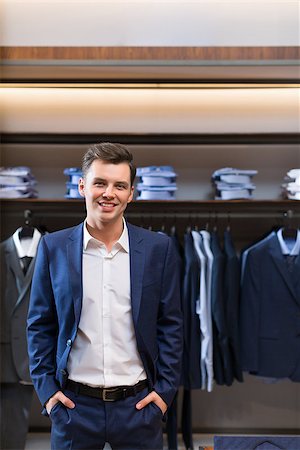 fashion store manager - Smiling man in suit indoors Stock Photo - Budget Royalty-Free & Subscription, Code: 400-08731918