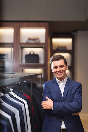 fashion store manager - Smiling businessman in a store Stock Photo - Budget Royalty-Free & Subscription, Code: 400-08731919
