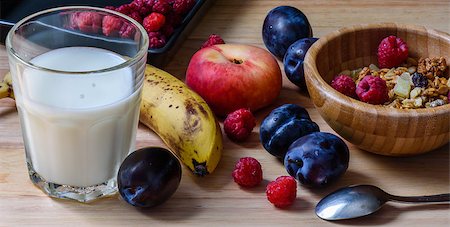 simsearch:400-04626602,k - Bowl of muesli with berries,fruits and glass of milk for breakfast. Superfood - very good and healthy breakfast Stock Photo - Budget Royalty-Free & Subscription, Code: 400-08731931