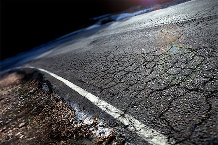 simsearch:400-04240814,k - Travel concept. Cracked asphalt and curve road.Road lines Stock Photo - Budget Royalty-Free & Subscription, Code: 400-08732528