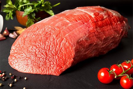 Still life raw beef round over black ground Stock Photo - Budget Royalty-Free & Subscription, Code: 400-08732533