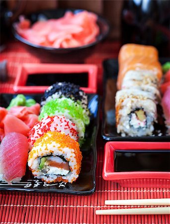 simsearch:689-03123940,k - Assorted of fresh delicious sushi and rolls on table, japanese food Photographie de stock - Aubaine LD & Abonnement, Code: 400-08732579