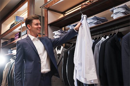 fashion store manager - Smiling businessman in store Stock Photo - Budget Royalty-Free & Subscription, Code: 400-08732699