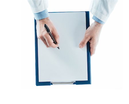 simsearch:400-08751444,k - Doctor writing a prescription on a clipboard on white background, top view, hands close up Photographie de stock - Aubaine LD & Abonnement, Code: 400-08749659