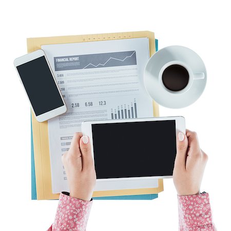 simsearch:400-08749588,k - Business woman working at desk and using a digital tablet, hands close up, top view Stock Photo - Budget Royalty-Free & Subscription, Code: 400-08749650