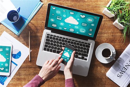 simsearch:400-08749588,k - Cloud computing and social network interface on a laptop, tablet and smartphone screen Stock Photo - Budget Royalty-Free & Subscription, Code: 400-08749705
