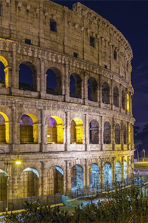 The Colosseum or Coliseum, also known as the Flavian Amphitheatre is an elliptical amphitheatre in the centre of the city of Rome, Italy. Evening Stockbilder - Microstock & Abonnement, Bildnummer: 400-08754776