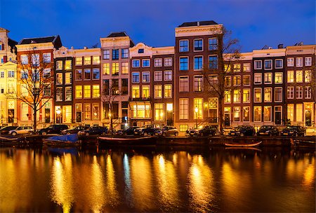 Typical dutch houses over canal with reflections illuminated at night, Amsterdam, Netherlands Stock Photo - Budget Royalty-Free & Subscription, Code: 400-08755967