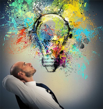 simsearch:400-07578321,k - Businessman sitting in a chair watching a light bulb drawn and thinks a new creative idea Stock Photo - Budget Royalty-Free & Subscription, Code: 400-08750235
