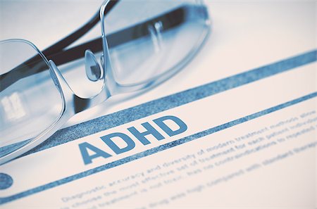 ADHD - Attention Deficit Hyperactivity Disorder - Printed Diagnosis with Blurred Text on Blue Background with Spectacles. Medical Concept. 3D Rendering. Foto de stock - Super Valor sin royalties y Suscripción, Código: 400-08750788