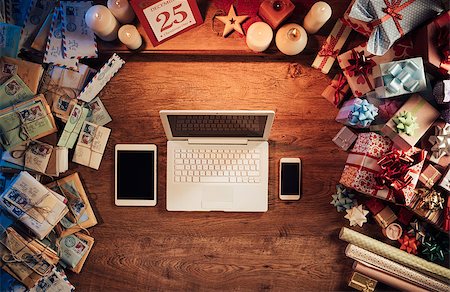 simsearch:400-08749588,k - Christmas desktop with laptop, tablet and smart phone surrounded by gift boxes and letters, top view Stock Photo - Budget Royalty-Free & Subscription, Code: 400-08751365
