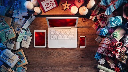 simsearch:400-08749588,k - Christmas desktop with laptop, tablet and smart phone surrounded by gift boxes and letters, top view Stock Photo - Budget Royalty-Free & Subscription, Code: 400-08751366
