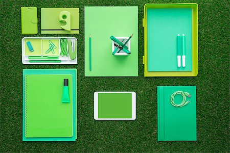 simsearch:400-09082260,k - Green office supplies and digital touch screen tablet on the grass, business and ecology concept Foto de stock - Super Valor sin royalties y Suscripción, Código: 400-08751407