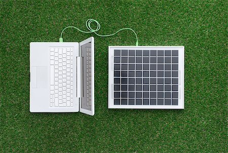 solar panels business - Laptop on the grass connected to a solar panel, alternative energy sources and electrical power generation concept Stock Photo - Budget Royalty-Free & Subscription, Code: 400-08751408