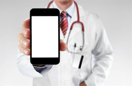 Doctor showing information on a smartphone Stock Photo - Budget Royalty-Free & Subscription, Code: 400-08751783