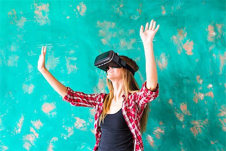 digital experience - Woman touching something using virtual reality headset glasses. Stock Photo - Budget Royalty-Free & Subscription, Code: 400-08752448