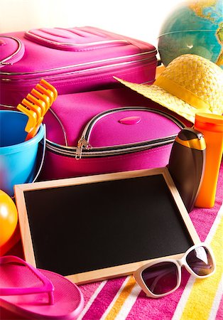 empty suitcase - Empty blackboard with summer holidays background, including sunglasses, sun cream and bag. Photographie de stock - Aubaine LD & Abonnement, Code: 400-08753284