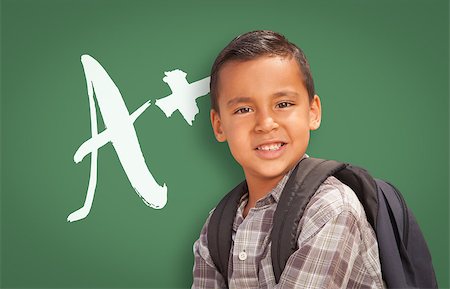 simsearch:400-04125503,k - Cute Hispanic Boy in Front of A+ Written on Chalk Board. Photographie de stock - Aubaine LD & Abonnement, Code: 400-08776674