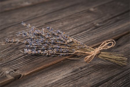 Close-up shot of dried lavender bouquet on grungy wooden background Stock Photo - Budget Royalty-Free & Subscription, Code: 400-08777628