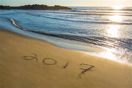 2017 written in the sand with a view of the ocean Stock Photo - Budget Royalty-Free & Subscription, Code: 400-08779639