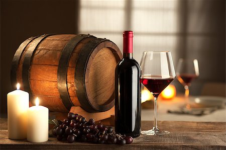 simsearch:400-09222970,k - Bottle, glass, grape and barrel still life with restaurant on background. Stock Photo - Budget Royalty-Free & Subscription, Code: 400-08771830