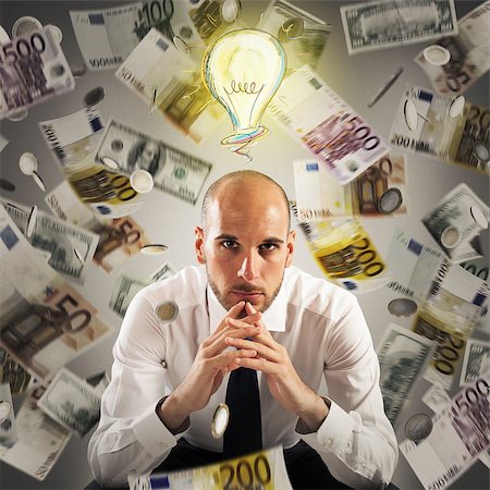 simsearch:400-07976631,k - Man with light bulb over his head and money background Foto de stock - Royalty-Free Super Valor e Assinatura, Número: 400-08772231