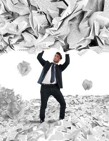 Businessman is repaired by a rain of big leaves Stock Photo - Budget Royalty-Free & Subscription, Code: 400-08784619