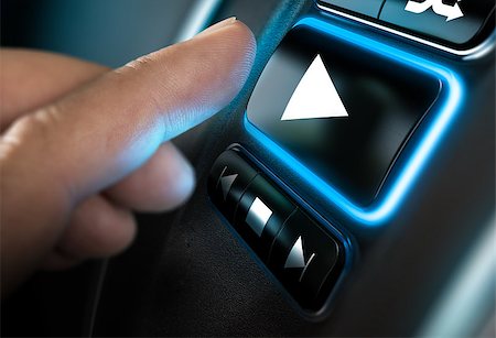 Finger about to press a play button on a home sound system interface. Black background and blue light. Composite between a photography and a 3D background. Horizontal image Stock Photo - Budget Royalty-Free & Subscription, Code: 400-08787134