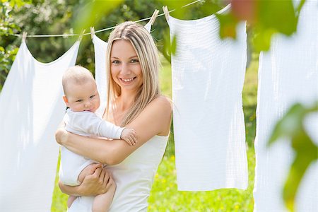 simsearch:400-08787277,k - Beautiful mother and her baby boy playing together outdoors Stock Photo - Budget Royalty-Free & Subscription, Code: 400-08787277