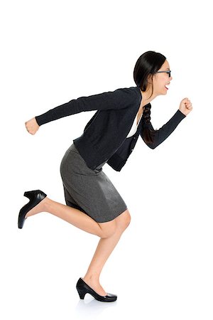 running in heels - Full length portrait of young Asian woman running, isolated on white background. Stock Photo - Budget Royalty-Free & Subscription, Code: 400-08787335