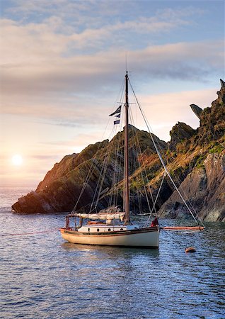 sailing on atlantic ocean - Yacht moored near the historic fishing village of Polperro, Cornwall, England. Stock Photo - Budget Royalty-Free & Subscription, Code: 400-08787765