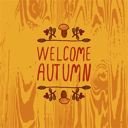 simsearch:400-08793659,k - Hand-sketched typographic element with mushroom, berries and text on wooden background. Welcome autumn Stock Photo - Budget Royalty-Free & Subscription, Code: 400-08787932